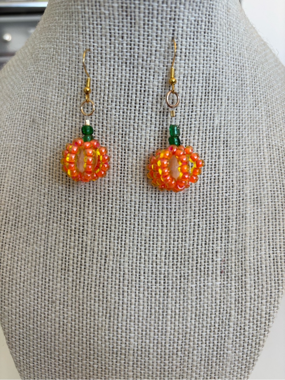 Festive Orange Beaded Pumpkin Drop Earrings with Green Accents